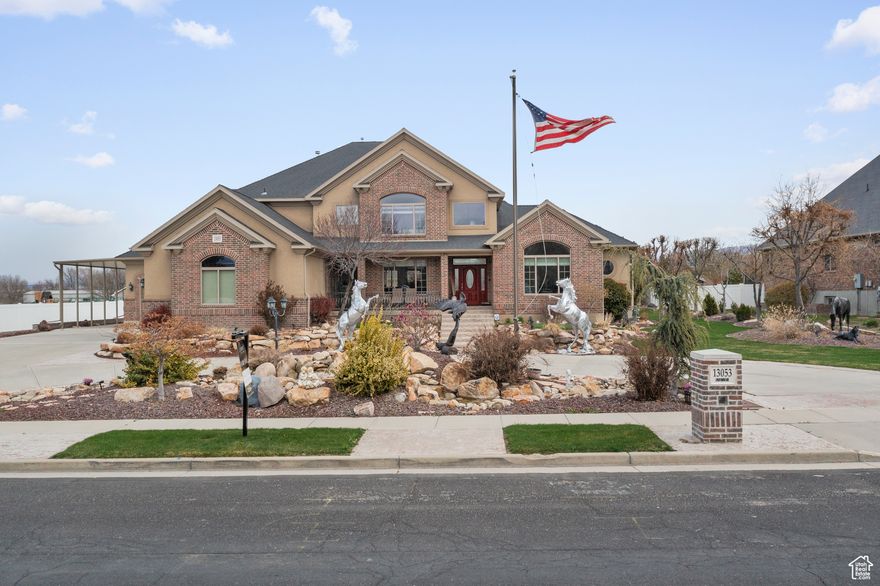NEW LOWER PRICE! DETACHED 18 CAR GARAGE with brand new epoxy flooring, heated, and a dedicated bathroom with hot and cold water. Nestled in one of Riverton's most coveted neighborhoods, this stunning 7,534 sq. ft. luxury home offers a rare combination of elegance, comfort, and high-end amenities.. For car enthusiasts and hobbyists, this property features a With 7 bedrooms, 4 full bathrooms, and 2 half bathrooms, this meticulously designed estate is a true masterpiece, showcasing breathtaking mountain views, exquisite craftsmanship, and modern conveniences throughout. Step inside to be greeted by beautiful marble floors that flow seamlessly throughout the main living area.  The expansive, open-concept layout is designed for both grand entertaining and comfortable family living.  Large floor-to-ceiling windows allow natural light to pour in, providing uninterrupted views of the Mountains. All the bedrooms are generously sized, with well-appointed bathrooms that offer comfort and convenience. The property features a 600 sq. ft. built-in fireproof safe, ensuring your valuables are well protected. This home is also equipped with built-in surround sound, ensuring an immersive entertainment experience throughout the property. With an RV garage provides even more room for storage, projects, or additional vehicles. Whether you have an RV, boats, ATVs, or a car collection, this space can accommodate it all. Situated on a meticulously landscaped lot, this estate offers a serene outdoor retreat. The stunning landscaping and water feature enhances the property's curb appeal while providing a peaceful environment to enjoy the surrounding beauty the property offers. An outdoor shed is already piped for gas, offering potential for customization, whether for an outdoor kitchen, fireplace, or other future additions. Located just moments from one of Riverton's premier golf courses, this estate provides the perfect blend of luxury living and recreational convenience. Enjoy easy access to top-rated schools, shopping, dining, and outdoor activities, all while being surrounded by the beauty of the Utah landscape. This extraordinary home offers unmatched craftsmanship, making it the perfect choice for those seeking a luxurious lifestyle. Schedule your private showing today to experience this one-of-a-kind estate!