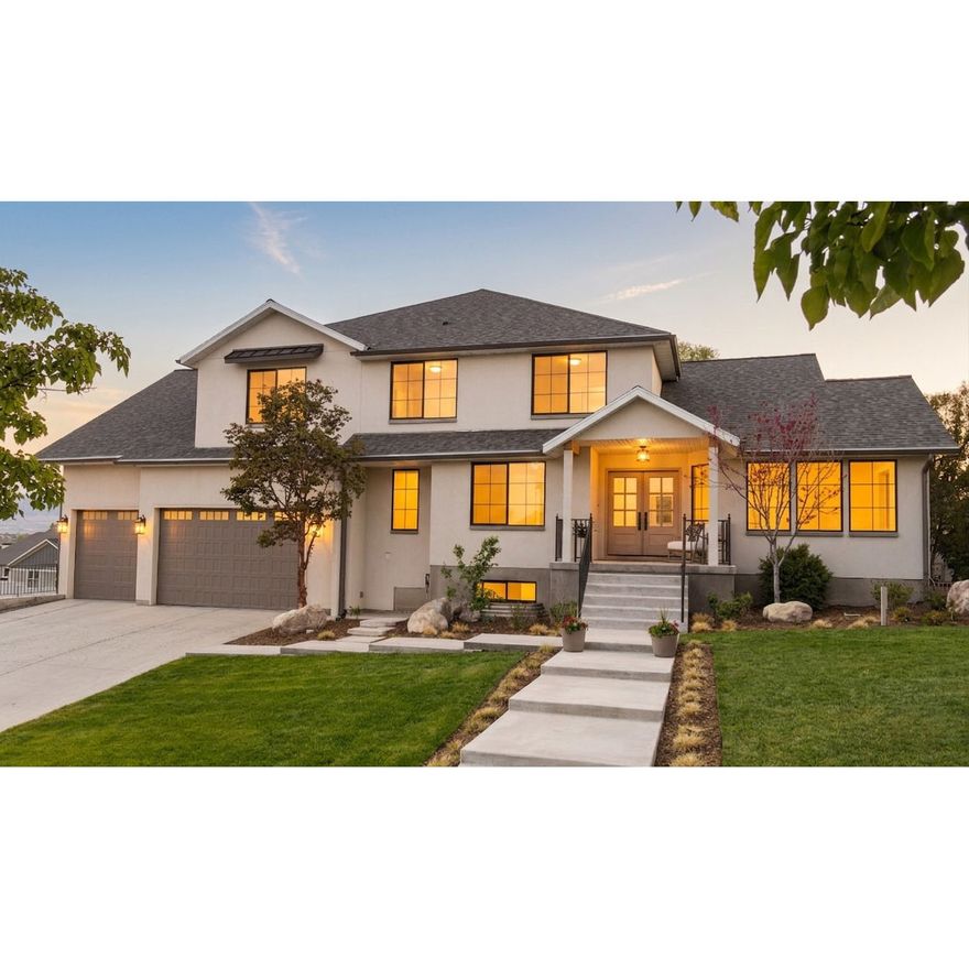 This completely updated South Jordan gem is everything you could want and more! The meticulous remodel included ALL NEW electrical, plumbing, heating, cooling, cabinetry, flooring, doors, windows, drywall and so much more. Truly this is a NEW home. The secluded cul-de-sac and breathtaking panoramic views welcome you home. Natural light floods every room and the chef inspired kitchen fit with taj mahal quartzite and solid hardwood floors brings natural elements flawlessly into the home. The butler pantry is a show stopper. This home was designed to take advantage of every possible view. The primary bedroom has oversized windows, spa inspired bathroom and large walk-in closet. Along with the seven bedrooms and eight bathrooms there are three family rooms, front room and home gym. With a separate private entrance you'll find the city approved apartment complete with one bedroom, one bathroom, laundry and gorgeous kitchen! This home sits on a large half acre lot. The 24x24 sport court could be home to a future two car detached garage. Enjoy the spacious yard, majestic tree, fire pit, large covered deck and patio, in-ground trampoline, fruit trees and large garden. The three car garage has two car charging outlets. You need to see this one in person!
