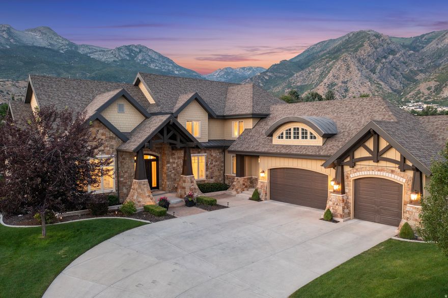 Meticulous craftsmanship, thoughtful design, & resort-style living converge in this exceptional luxury residence located in the prestigious Heritage Hills subdivision. Designed for both refined everyday living & unforgettable entertaining, this home delivers elegance at every turn. The main level welcomes you with 10' barrel vaulted ceilings, 8' doors, wide 6" engineered oak hardwood floors, 8" custom moldings, a   Juliet balcony, plantation shutters, & rich custom woodwork throughout. A 4' wide staircase adds architectural drama while enhancing flow & openness. The heart of the home is a chef's kitchen featuring a built-in refrigerator, warming drawer, ice maker, oversized center island, glass backsplash, & a beautiful blend of quartz & granite countertops. An oversized dining area & a pantry fit for a queen make hosting effortless. The sunken family room stuns w/ 24' ceilings & an elegant fireplace- an inviting space that feels both grand & intimate. The main-floor primary suite is a true retreat, offering tray-lit ceilings, elegant bay windows w/ unobstructed mountain views, remote-controlled shades, an electric fireplace, a spa-inspired en-suite w/ a standalone soaking tub, oversized shower w/ dual shower heads, double vanities w/ a dedicated makeup counter, & a spacious walk-in closet. Additional highlights include: Main-floor laundry and craft room, Mudroom w/ service entrance & custom built-ins, Abundant storage throughout, a gym/dance studio w/ equipment included, Professional golf simulator that doubles as a multi-game system, 2 hot water heaters, 30' wide x 60' deep RV parking, & the ultimate two-story playhouse for kids or grandkids! Upstairs features 9' ceilings, 3 generously sized bedrooms, & a Jack-and-Jill bathroom. The property also includes a 1-bedroom, 1-bath ADU w/ a private entrance, currently rented for $1,200/month- perfect for guests, extended family, or income potential. Step outside to a serene, professionally landscaped backyard designed for year-round enjoyment. Features include a covered patio, saltwater pool w/ waterfall, water features, multiple fire elements, strung lighting, a storage shed, & plumbing already in place for a hot tub & outdoor kitchen. This is more than a home-it's a private Alpine estate offering luxury, functionality, & lifestyle in one of Utah's most coveted communities.