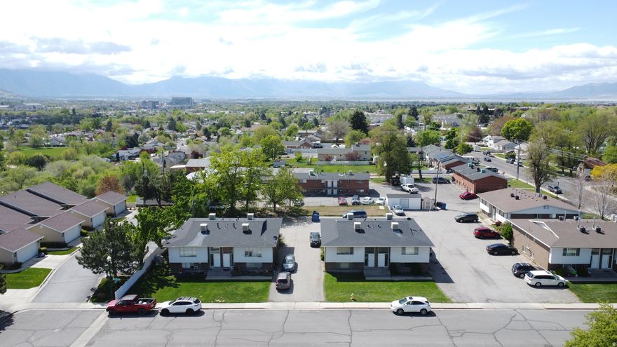 Fantastic investment opportunity in a corridor with very strong rentability for similar units - Excellent location just minutes from UVU, Frontrunner, the University mall, etc. There are two 4-plex properties for sale, side-by-side, and the seller will only sell both together as a package to one buyer. Refer to listing ID 2150469. Both roofs were fully replaced in 2024. The owner is a sweet older lady. She has not kept rents "at market" because she has felt bad raising rents or has given discounts for other reasons. Some tenants have been in the property for over 10 years. Some are related to the owner. Conservative pro-forma rents are $1,250/mo for 7 of the units, and $1,350 for the one that has been remodeled (See marketing brochure) - Total of $121,200 Gross Income Potential once all 8 units re-tenanted. All leases expire in June or July, such that the new owner will be able to reposition every unit to a market rent in a very timely fashion and should be a fairly simple process. You will see in the rent roll all the actual rents at the bottom of the MLS listings. See the attached marketing brochure which demonstrates what market rates are. There is an extra land parcel of significant size on the south part of the property  currently a fenced-in grass area. This can potentially be monetized in the future through constructing undercover parking, storage, or another 4-plex.  One unit was remodeled in 2023 for a family member. The rest have simply been maintained with appliances, carpet, furnaces, paint, etc, as needed. Property is sold as-is. Seller not interested in seller financing. Square footage figures are provided as a courtesy estimate only and are not guaranteed. Buyer is advised to obtain an independent measurement