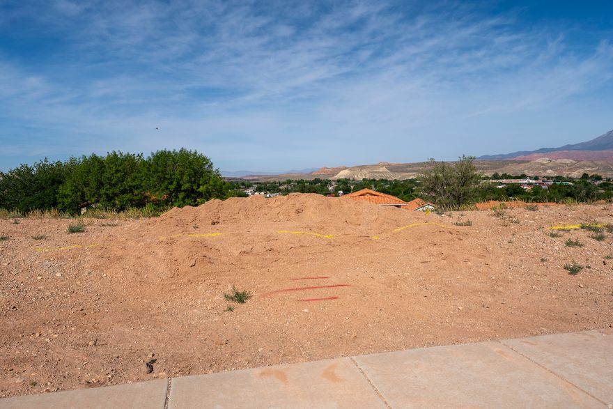Conveniently located in La Verkin just minutes from Zion National Park, this .23 acre lot has walk-out basement potential. Providing the perfect opportunity to build in Southern Utah without the burden of HOA fees, this affordable building lot has a lot to offer. Tucked into a relaxed neighborhood, you will enjoy sweeping views of the valley and surrounding red rock mesas without paying premium resort prices.
