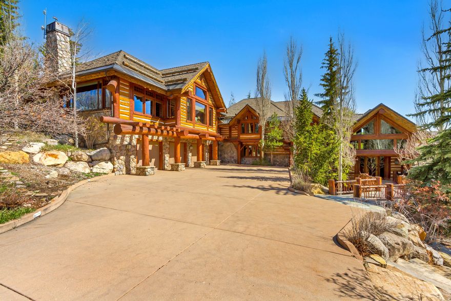 Priced for quick sale and at small fraction of replacement cost! This is your own private resort for cross-country skiing, snowshoeing, hiking, and more. Designed by renowned architect Fred Babcock, this masterpiece sits on over 16 acres surrounded by awe-inspiring water & mountain views, and wide-open spaces. Enjoy the ultimate privacy yet under 10 minutes to skiing at Deer Valley and Park City Mountain Resorts and Historic Main Street for exclusive shopping and fine dining. This home was built to entertain, featuring a gourmet kitchen, multiple entertaining areas, executive office, wine cellar, 6 luxurious suites including bunk room, wood & gas-burning fireplaces, and multi-level outdoor living spaces. Hike, bike, ski and snowshoe from the property and end the day in your indoor hot tub and sauna or outdoor swim hot tub. Every detail is unique and hand-made, featuring renowned works of art, including carved log details, one-of-a-kind lighting fixtures, sculptures, and custom carved cabinetwork, many by acclaimed western artist Peter Fillerup. Adjacent to and privacy from hundreds of acres of undeveloped open space, watch moose, elk, deer, and other wildlife meander while overlooking thousands of acres of the Uintas. Turn-key availability. Has extensive unique and high-value furnishings and art, valued in the millions of dollars. Selected contents and price is to be negotiated with the Seller.