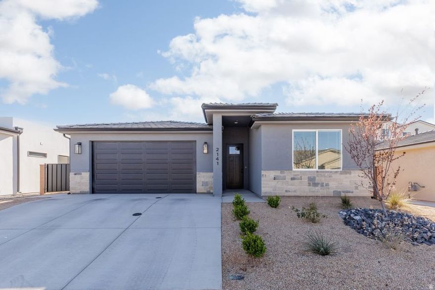 Beautifully maintained 3-bedroom, 2-bath home in Hurricane offering spacious living and high-end finishes throughout. The open layout provides comfortable living areas, a well-appointed kitchen, and a move-in ready feel that reflects true pride of ownership. Ideally located just minutes from Sand Hollow and Quail Creek Reservoirs, with easy access to boating, fishing, golf, ATV trails, and Zion National Park. Enjoy the convenience of nearby shopping, dining, and all the outdoor recreation Southern Utah is known for.