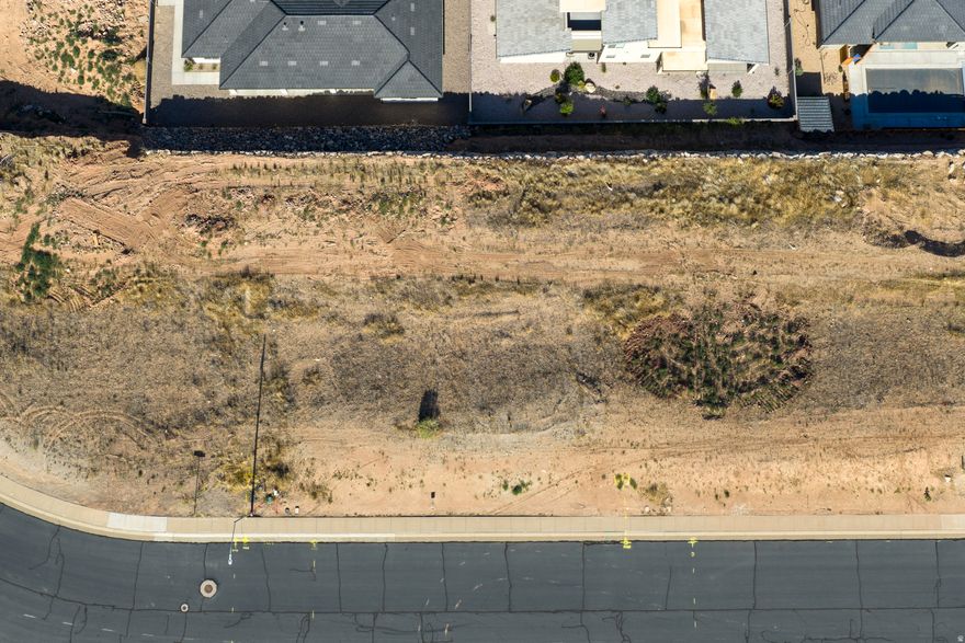 Conveniently located in La Verkin just minutes from Zion National Park, this .23 acre lot has walk-out basement potential. Providing the perfect opportunity to build in Southern Utah without the burden of HOA fees, this affordable building lot has a lot to offer. Tucked into a relaxed neighborhood, you will enjoy sweeping views of the valley and surrounding red rock mesas without paying premium resort prices.