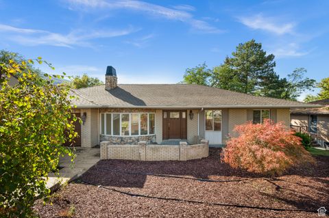 Photo of 3404 E ENCHANTED HILLS DR S, Cottonwood Heights, UT 84121 (MLS # 2118365)