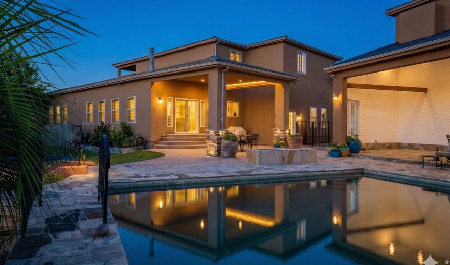 Welcome to this extraordinary home that absolutely needs to be experienced, not just viewed! The home boasts a wide range of impressive features that set it apart from the rest. This 3.43 acre equestrian property is zoned for keeping up to eight horses, making it an ideal sanctuary for both humans and their equine companions. Situated two-feet higher than its neighboring properties, this estate exudes an exceptional sense of grandeur and prominence with river access for the avid ATV rider. The HUGE detached RV garage was designed to accommodate two class A motorhomes, ensuring ample space and convenience for all your outdoor adventuring needs. Furthermore, the garage is outfitted with hot water supply, for RV hook up, car washing or a variety of tasks. Plus, above the garage  there is a beautiful, fully equipped dance studio with a gorgeous full bathroom and several mini-split systems for heating and cooling.  The yard is an absolute sanctuary with gardens, orchards, and an oversized 50,000-gallon all-natural pool, reaching a depth of 14 feet. This stunning oasis of relaxation and entertainment promises a refreshing escape from the outside world. Enhancing the outdoors, this property offers not one, but two outdoor showers, a sunken fire-pit with seating gathering under the stars and a gas fire pit for ambiance. An incredible cabana with a loft offers escape from the sun poolside. All this provides for a truly unique and rejuvenating experience amidst nature's beauty.  Entertainment takes center stage in this home, which features a remarkable 4K theater room that provides a cinematic experience within the comfort of your own home. Complementing this, there is also a dedicated music studio with double sound board walls, catering to those with a passion for creating and producing music or any audio-related ventures.  Safety and security were also in mind during the design phase and a major highlight of this property is the inclusion of French drains, guaranteeing efficient drainage and preventing any potential water damage.. Built with flood control measures in mind, this home is equipped with flood retaining capabilities to ensure maximum protection and peace of mind during inclement weather conditions. The thoughtfully designed basement includes windows with emergency stairs, allowing for easy and safe exit strategies in case of any unforeseen circumstances.  This incredible home promises a lifestyle filled with luxury, convenience, and limitless possibilities. Don't miss the opportunity to make this extraordinary property your own.