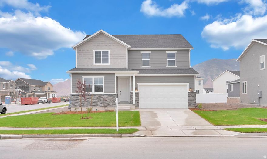 ****Ask about our 3.75% rate with our preferred lender! Restrictions may apply****  This stunning Ammolite is a 5-bedroom, 3-bathroom home that offers 3,041 square feet of thoughtfully designed living space, providing both comfort and luxury. As you enter, you're greeted by a spacious foyer that leads to a main floor bedroom and full bath, as well as an inviting study, perfect for a home office, formal dining or a library. The heart of the home is the expansive kitchen, featuring a large sink in island. Equipped with modern stainless steel appliances, including a fridge, gas range, microwave, and dishwasher. The adjoining living and dining areas offer plenty of space for family gatherings, with double sliding glass doors that bring in natural light and offer views of the mountains. Upstairs, you'll find a cozy loft, three generously-sized bedrooms, a bathroom with dual sinks, and the Owners suite, with a luxurious en-suite bathroom featuring dual vanities, walk in shower, and a bedroom sized walk in closet. Located on a corner lot, this home is in a prime spot, and a park a short walk away.