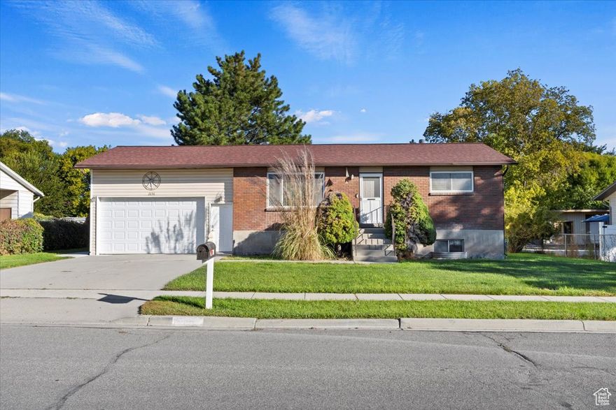 *Price Reduced!*  This home has tons of potential at a great price!  The kitchen was recently remodeled with custom cabinetry and granite counter tops.  All appliances included!  Newer double pane vinyl windows throughout the home.  The yard is beautifully maintained and fully fenced.  The main level would be easily transformed with some new flooring and paint.  Downstairs, the unfinished basement provides a blank canvas to make it your own.  The garage is extra deep and tall.  This is a quiet neighborhood with easy access to everything, including very close proximity to the elementary and junior high school.  Come see for yourself today!