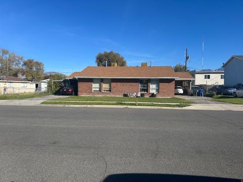 Photo of 2339 S DERBY ST W, West Valley City, UT 84119 (MLS # 2122070)