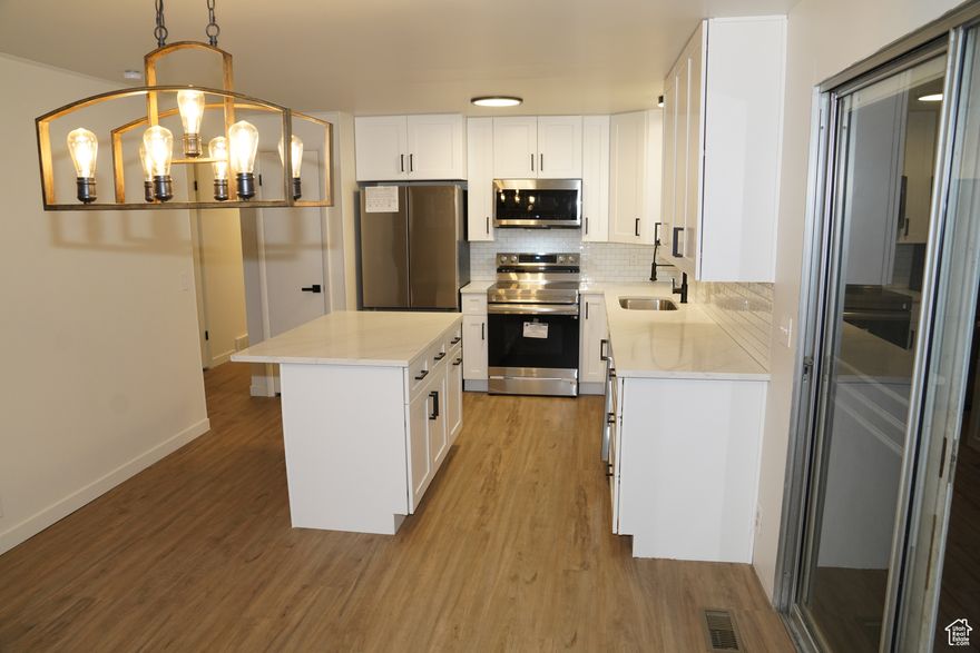 Accepting backup offers. BRAND NEW ROOF, FULL NEW KITCHEN, FLOORING, PAINT interior and exterior.  This home is ready for it's new buyers. This home is less than five minutes to jump on I-215 for convenience, a few minute walk or drive to the Valley Fair mall area shopping, stores and many food options.  Think about the equity you will get in this fixed up house as we approach the olympics again.  There are many first time homebuyer programs out there to help make your dream a reality for less than you think. I have numbers run for this property already,  Reach out for any questions or if you want to view the house I will take you through anytime.