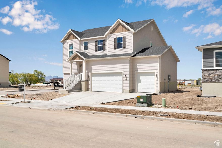 Current Incentives have rates as low as 3.75% FHA/VA. Restrictions apply contact me for details!!       Beautiful 2-story Bedford floor plan available in the development at the base of the Mountain in Lake Point. Inside, you'll find a spacious great room, a kitchen with beautiful quartz countertops, a center island, a breakfast dining area, and a sliding glass door leading to a spacious backyard. The lavish owner's suite boasts an immense walk-in closet and deluxe master bath and is separated from two additional bedrooms for privacy.