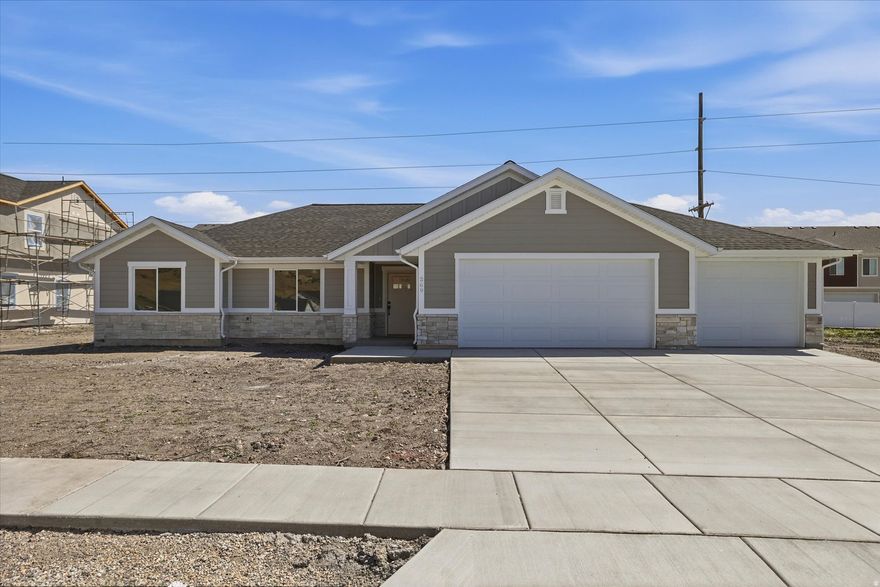 Sitting in a vibrant new neighborhood in Brigham City UT, this stunning brand-new patio home features breathtaking views and high end finishes. With 3 bedrooms and 2 bathrooms, this home offers an open-concept layout, where vaulted ceilings and abundant natural light create an inviting atmosphere ideal for entertaining. The spacious kitchen is equipped with modern appliances and plenty of cabinet space. The 3 car garage is convenient for your vehicles or extra storage. Enjoy the convenience of single-level living where the master suite is a true retreat, featuring a walk-in closet and a connected bathroom complete with two sinks, a large soaking tub, and a separate shower. Don't miss your chance to see this remarkable home in person-be sure to check out the virtual tour!