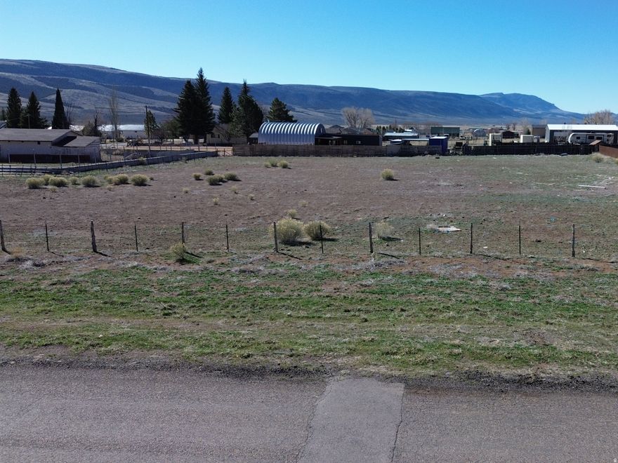 Escape to the quiet charm of Koosharem with this beautiful 0.94-acre lot, perfectly positioned to take in the wide-open views and peaceful surroundings that make this area so special. Whether you're dreaming of building a cozy cabin, a full-time residence, or simply investing in a slice of Utah's natural beauty, this property offers endless potential.  Surrounded by rolling landscapes and fresh mountain air, you'll enjoy the serenity of small-town living while still being within reach of outdoor adventures, including nearby lakes, trails, and scenic public lands. The generous lot size provides ample space for your vision. Gardens, outbuildings, or room to spread out and enjoy the quiet.  Opportunities like this don't come often in Koosharem. Come experience the slower pace, star-filled skies, and the kind of peace that's getting harder to find.