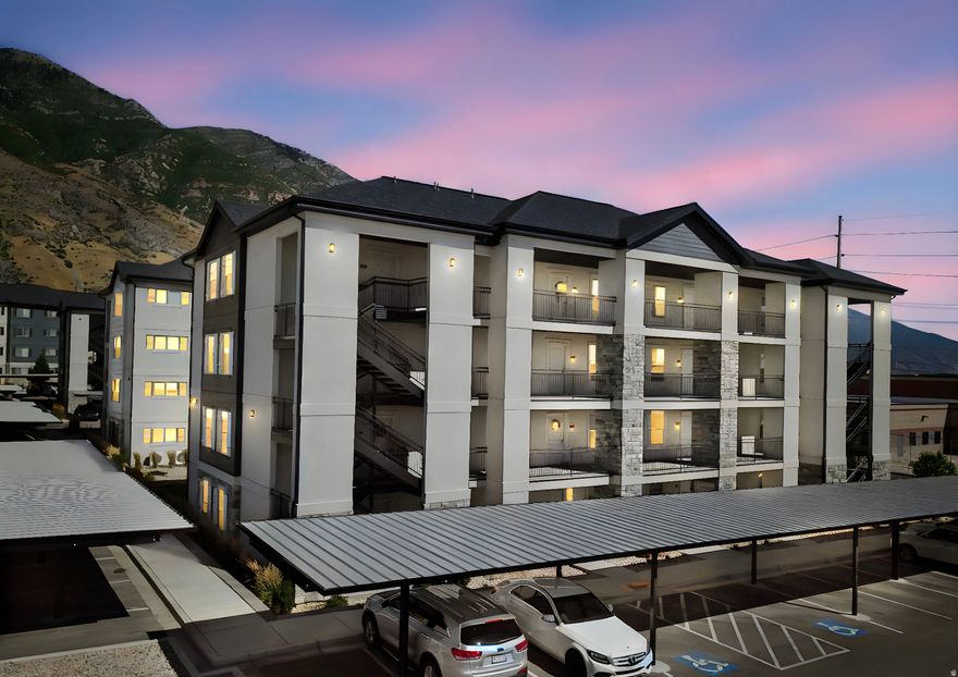 Bottom Corner Unit!  Beautiful, clean, and on the main floor corner.  This condo is perfect for your empty nester, young family, or first time homebuyer.  FHA approved and away from the street.  Best building in the development with easy access to your covered parking spot.