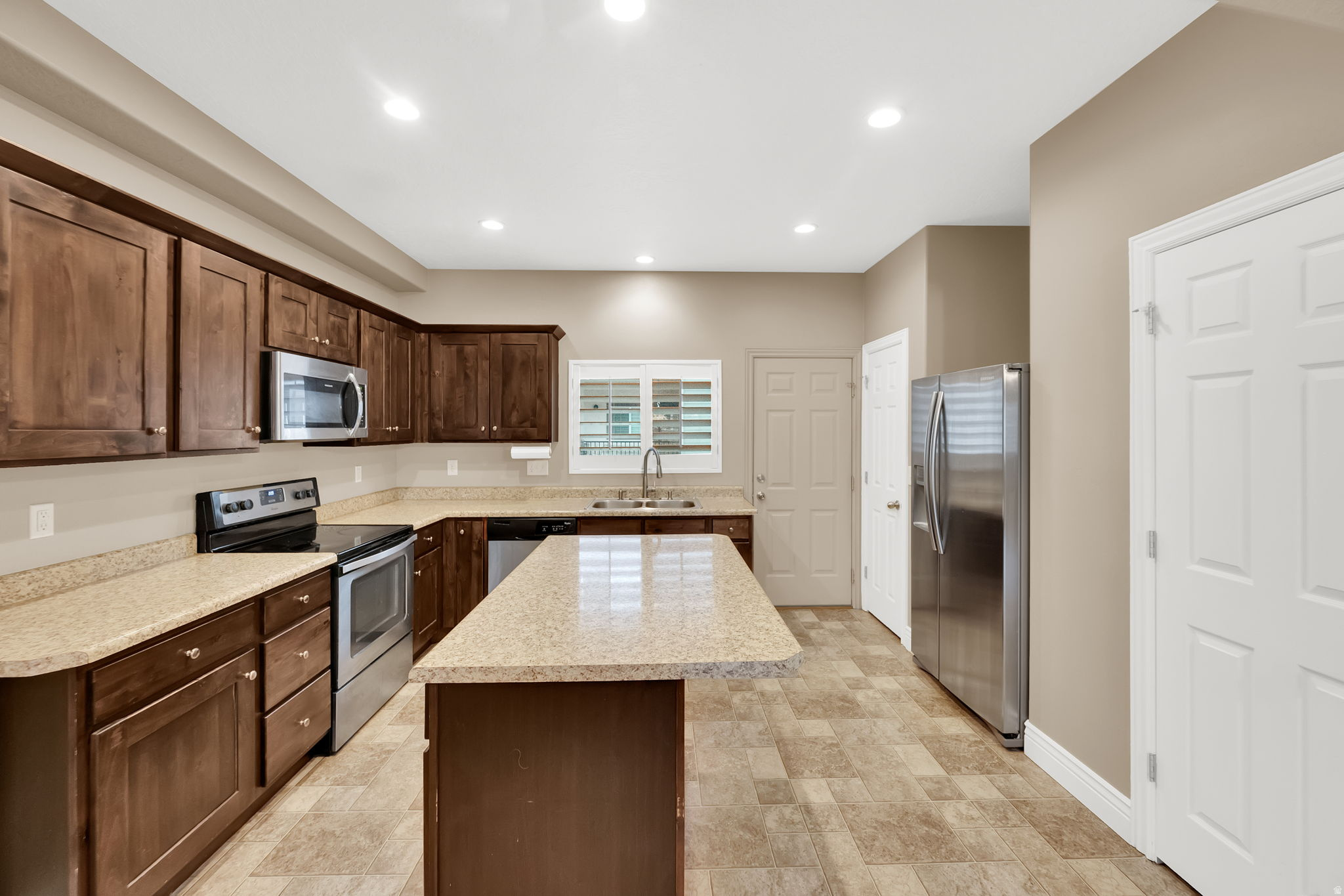 EAST TOWN VILLAGE TOWN HOMES - Residential