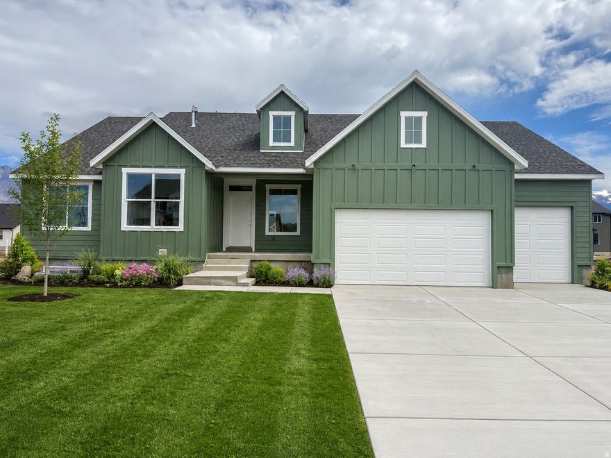 Our Farmhouse "Newport" home design has 6 bedrooms, 3 bathrooms and a huge 4 car garage with walkout entrance from the basement to the garage. The large lot boasts mountain views with plenty of room for your toys or future garden. The upgraded kitchen with stylish cabinets & quartz countertops is the perfect spot for entertaining. Enjoy the freedom of NO HOA while being conveniently located right by pickleball courts, parks and indoor soccer arena. Come see what our beautiful and popular Riverwood Community in South Weber has to offer!