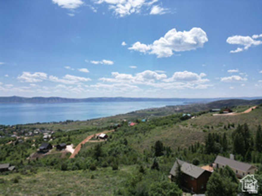 Top of Bear Lake West  Secluded Wooded Lot with Stunning Lake Views. Build your dream retreat in the highly sought-after Bear Lake West community. This private, wooded lot offers sweeping views of Bear Lake from north to south-an ideal setting for your custom getaway or full-time escape from the hustle. Enjoy year-round access and a lifestyle packed with amenities, including: Discounted golf for members Heated outdoor pool (summer) Private beach access for Bear Lake West owners Pickleball & tennis courts Create your Bear Lake hideaway & start living the lifestyle you've been dreaming about. HOA Note: No short-term rentals permitted.