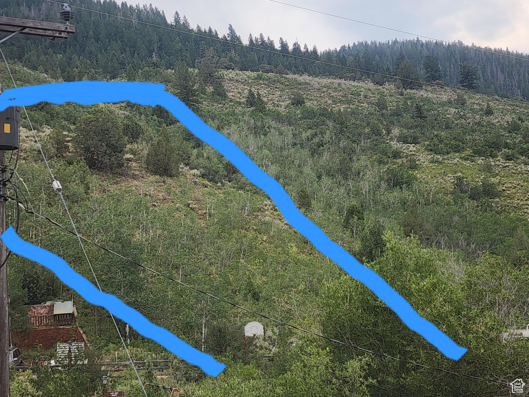 Rare 1 acre lot on a private cul-de-sac backing the Uintah National Forest just off the scenic Mirror Lake highway. Aspens, pines, junipers, wildflowers, animals and even fossils adorn the most breathtaking mountain views. Just minutes away from unlimited hiking, biking, camping, skiing, snowmobiling and memories galore to be made! This price and amount of acreage for this coveted and secluded area is a rare and will go quickly. Come hike the lot, fall in love with the land and views, and make it yours today before someone else snags this slice of serenity! Power is at the property line to be pulled in. Propane, septic and a well will need to be added. There is a voluntary HOA to help maintain the community roads and bridges, for $150 per year. Go and show lot. No gate or codes to worry about. The lot has been surveyed and staked. Watch out for deer and moose!