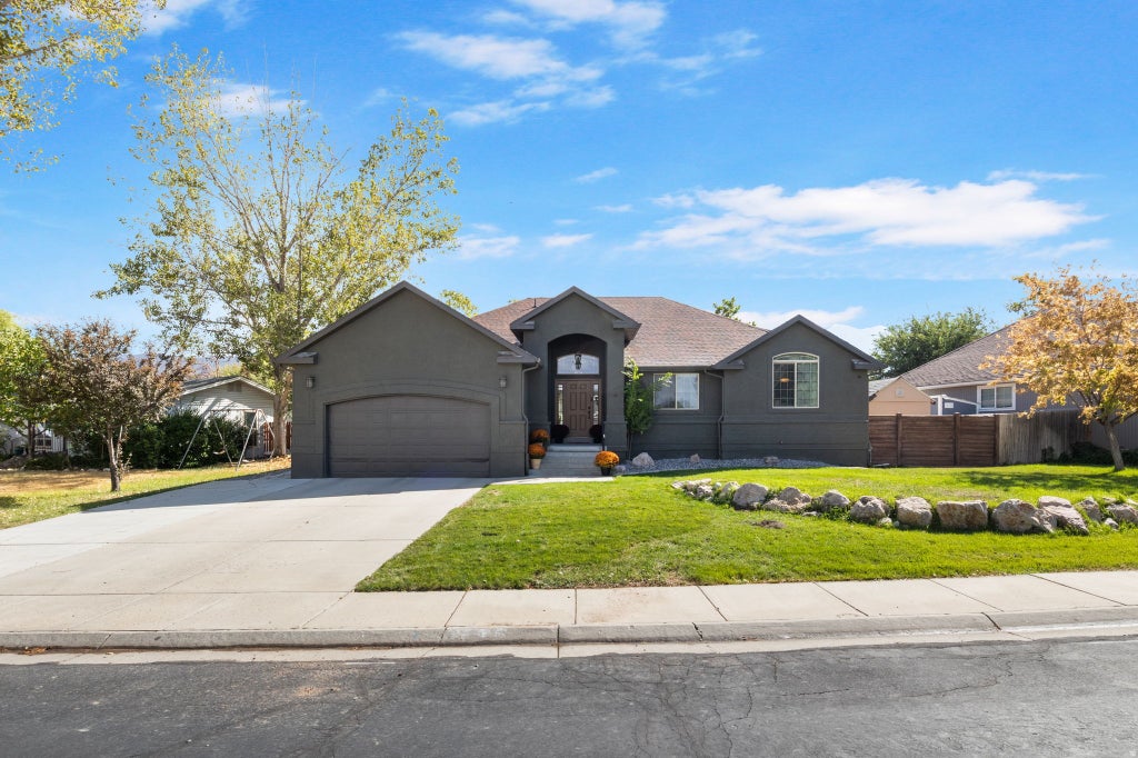 Photo of 495 COUNTRY CLUB DR, Stansbury Park, UT 84074 (MLS # 2185973)