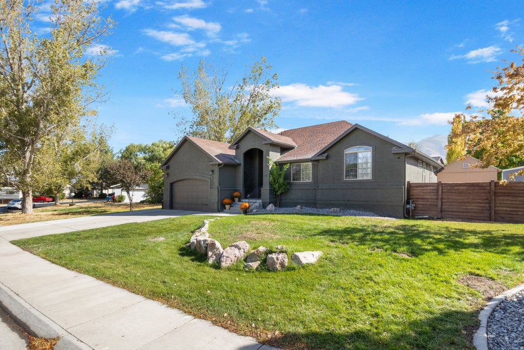 Photo of 495 COUNTRY CLUB DR, Stansbury Park, UT 84074 (MLS # 2185973)