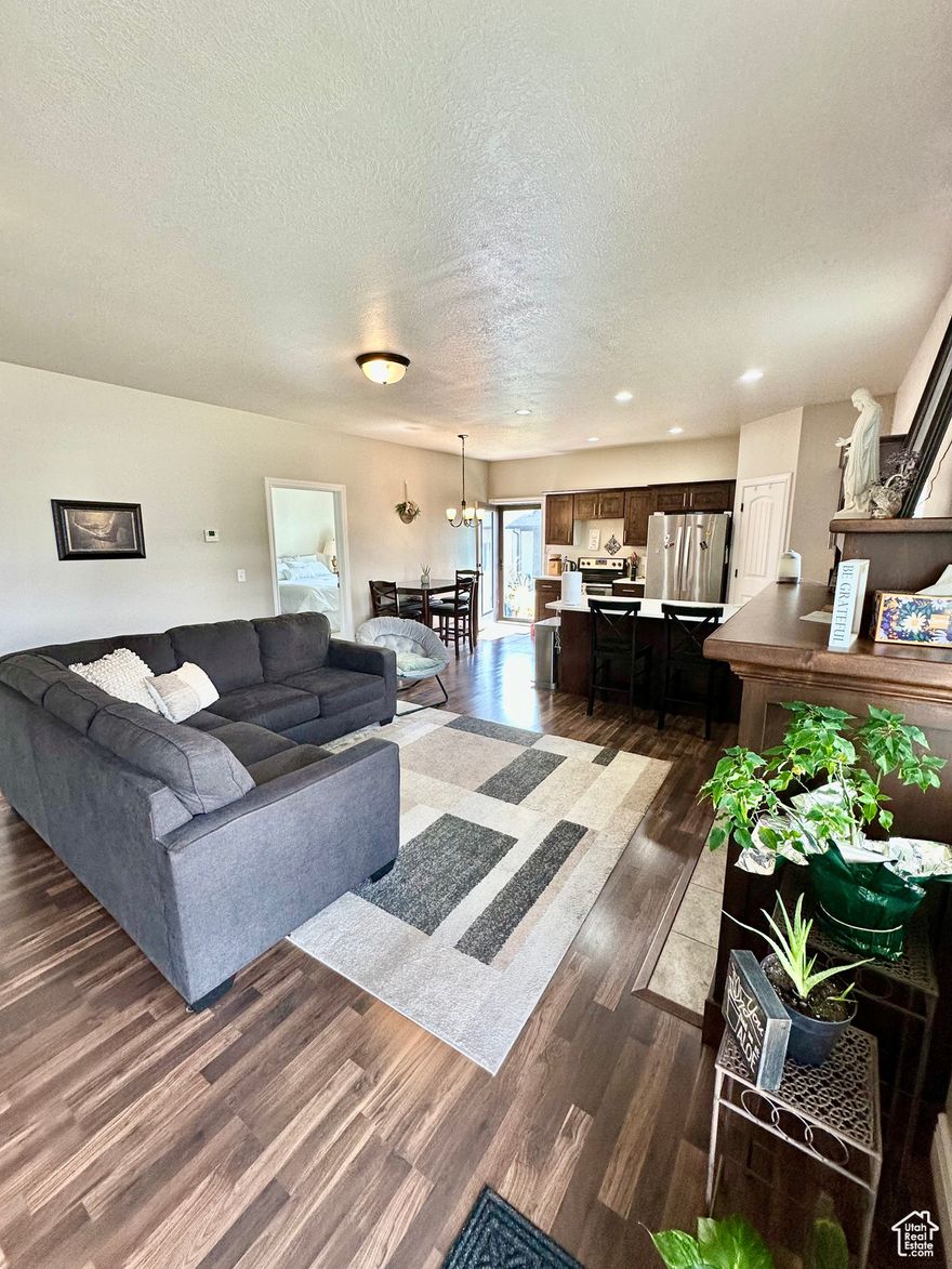 This beautiful 5 bedroom, 3 bath townhouse offers the perfect blend of space, comfort, and luxury. With a 2-car garage, there's plenty of room for vehicles and storage. Inside, you'll find an open layout. Located in a sought-after community, residents enjoy access to a clubhouse featuring a cardio gym, weight room, and an impressive 40-seat private movie theater-perfect for entertaining or relaxing. Soak up the sun at the resort-style pool, float along the lazy river, or enjoy the fun of the waterslide.  This home and its community amenities offer everything you need to live your best life. Don't miss out-schedule your private tour today!