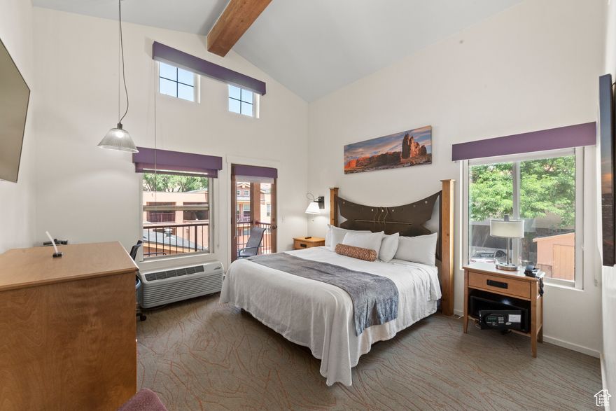 Downtown Moab Treasure  Turnkey Condotel Investment Opportunity!  Discover Moab's only condotel, a rare opportunity to own a fully furnished, income-producing property right in the heart of downtown! This stunning 2-bedroom, 2-bathroom unit is the perfect blend of luxury and adventure. Step outside to explore local shops, restaurants, and world-class trails, then return to your private poolside retreat.  Inside, dramatic vaulted ceilings and two spacious balconies frame breathtaking views of Moab's iconic red rock formations. Whether you're unwinding at the wet bar, relaxing in the stylish living room, or soaking up the desert sunsets, every moment here feels like a getaway.