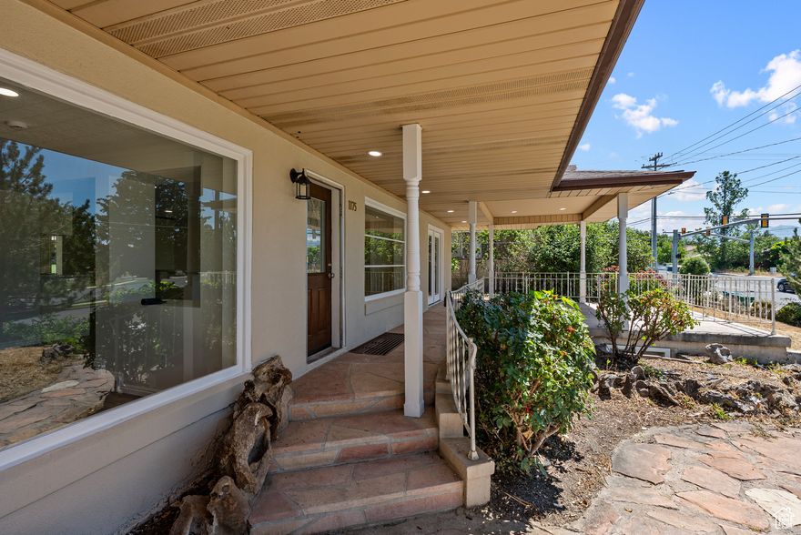 Experience modern comfort with country living in the heart of Lehi. This beautifully remodeled 3-bedroom, 3-bath home sits on 1.585 acres of prime horse property, offering space, flexibility, and an ideal location. The fully updated interior features an open, light-filled floor plan and a brand-new kitchen with quartz countertops, abundant cabinetry, and an adjacent storage or breakfast nook. The main-floor primary suite includes a private bath and walkout to a covered patio for peaceful outdoor living. The basement offers a separate garage entrance, providing excellent potential for an ADU, workshop, or additional living space. Enjoy covered patios front and back, a fully landscaped yard, and private driveway access off 1200. The expansive, horse-ready acreage allows room for animals, recreation, or future additions. A second parcel is included for private road access (Tax #12-048-0330, .055 acres). The main parcel (Tax #12-048-0372) totals 1.53 acres and is zoned RA1 & R18, offering outstanding flexibility and long-term value. A rare opportunity to own space and style in one of Lehi's most desirable areas.