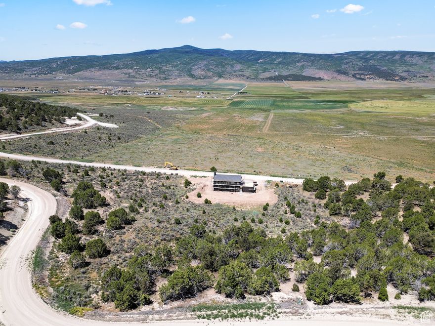 Trade the noise of the city for the peace of the pines on this stunning 1+ acre lot in Blackhawk Mountain Estates. Tucked away in a private, gated community and surrounded by tall trees, this recreational lot is the perfect backdrop for your mountain getaway-whether you're dreaming of building a rustic cabin, setting up a seasonal RV spot, or simply having your own slice of nature to retreat to. With year-round access via maintained roads, you'll enjoy all four seasons in this mountain paradise. Water, and high-speed internet are already in place, power will be installed soon, so you can hit the ground running with your plans. Just 30 minutes from Spanish Fork and only about an hour from Salt Lake City, you'll feel miles away without being far from the essentials. Come enjoy the quiet, the wildlife, and the freedom to create your own retreat in the woods.