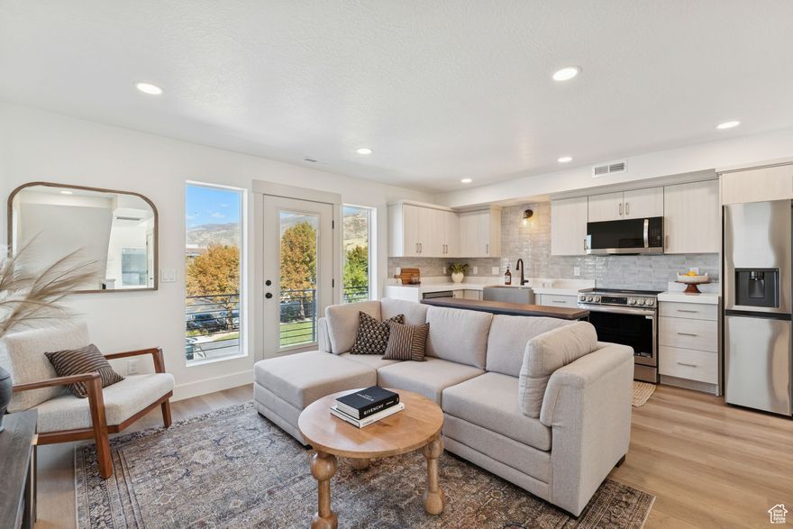 **Ask about our AMAZING preferred lender incentives!**  Welcome to Bountiful's newest 2-bedroom townhomes on historic Main Street - a setting so charming, it's been featured in Hallmark movies! Each townhome offers an attached 2-car garage, two spacious bedrooms with ensuite baths, a flex space on the first floor (perfect for an office or gym) and a modern, open kitchen perfect for entertaining. Enjoy your private balcony-ideal for grilling or taking in views of the mountains and Main Street! Just 15 minutes to Salt Lake City and about 30 minutes to Park City's ski slopes, festivals, and mountain trails! Easy freeway access and walkability to local shops and dining. Whether you're looking for a low-maintenance lifestyle, an investment property, or a lock-and-leave home near it all, these townhomes combine small-town charm with big-city convenience. Schedule your tour today! All townhomes are move-in ready!