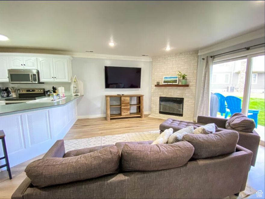 This unit is a GEM! Remodeled in 2020, fully furnished and ready to go from day 1. Amazing lake views of the marina and the surrounding mountains. You are only steps from the community pool, spa, trails, marina, and big grass area to hang out and play. Current owners have made this into a perfect short term rental or an owners get away. Plenty of space to have a big family hanging out and still be comfortable. Right in the heart of Garden City and close to all of the action. Buy now for a summer of fun or to do short term rental. It is being used as a short term rental already with 5-star rating and Super Host status with all the systems and processes in place.