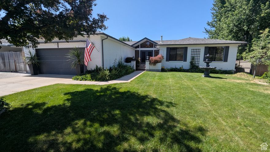 Stunning, updated 3,600 sq. ft. home in the heart of Sandy, Utah. Offering modern elegance and versatile living spaces. This beautifully maintained property features a main level with 3 bedrooms, 1 full bath, and 1 3/4 bathroom.  Showcasing luxurious travertine and slate flooring. Enjoy a separate dining room, formal living room, perfect for entertaining or relaxing. The home has the potential of a fully equipped Additional Dwelling Unit (ADU) with a private entrance, ideal for guests, extended family, or rental income. Outdoor amenities include a covered patio for year-round enjoyment and a covered, enclosed carport for convenience. With meticulous updates and thoughtful design, this Sandy gem combines style, functionality, and flexibility in a prime location , within minutes of both big and little Cottonwood Canyons, and only 25 minutes from Salt Lake City International Airport.  Don't miss the opportunity to own this exceptional home!