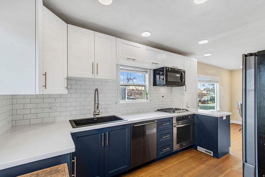 PRICE REDUCTION! MOTIVATED SELLER! This darling updated Provo home combines modern finishes with classic charm, making it the perfect starter home or low-maintenance investment property in a high-demand area. Natural light fills every room, beginning with a beautifully refreshed kitchen featuring navy cabinetry, subway tile, quartz-style counters, and stainless steel appliances. The layout offers three comfortable bedrooms, two full bathrooms, and a cozy lower-level family room-ideal for first-time buyers, young families, students, or anyone looking for a move-in ready home near BYU and downtown Provo.  The deep, wide backyard is a rare find in this part of Provo, offering space to garden, play, host, or explore future projects-all with stunning mountain views and incredible sunset light. Located on a quiet, established street near parks, schools, and local conveniences, with quick access to I-15, this property delivers an easy, everyday lifestyle with great long-term potential. Whether you're looking for a comfortable home or a smart rental opportunity in a low-vacancy area, this Provo gem checks all the boxes.