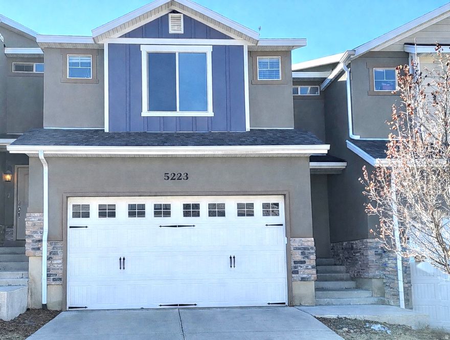 This beautiful townhome, located in a highly sought-after Herriman subdivision, offers 3 bedrooms and 3 full bathrooms, plus a fully finished basement that serves as a fourth bedroom. Enjoy Herriman views and an open-concept kitchen, dining, and living area-perfect for entertaining.  The primary suite features spacious his-and-hers walk-in closets, while the secondary bedroom offers an even larger walk-in closet. The finished basement includes a private bedroom, full bathroom, a convenient kitchenette with a sink, refrigerator, and stovetop, as well as a dedicated cold room for storage. Ceiling fans are installed in every room for added comfort. The first floor has been recently painted, adding a fresh, move-in-ready feel.  Square footage figures are provided as a courtesy estimate only and were obtained from county records. Buyer is advised to obtain an independent measurement.
