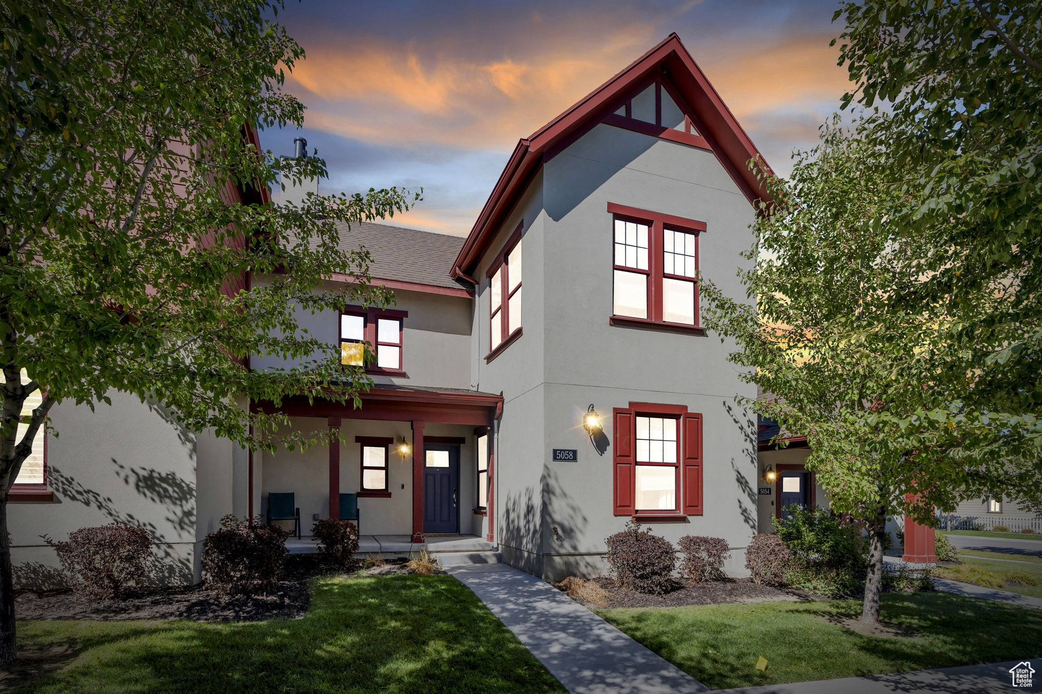 Discover easy living in this beautiful two-story townhome in the heart of Daybreak! The main floor features a spacious primary suite with a private ensuite bath, offering the convenience of single-level living with the bonus of extra space upstairs. The open-concept kitchen, dining, and living area is perfect for gathering, highlighted by vaulted ceilings and large windows that fill the space with natural light. Upstairs, you'll find a versatile loft and an additional bedroom-ideal for guests, kids, or a home office. Step outside to the private back patio, perfect for relaxing or entertaining right off the main living area. Enjoy unbeatable access to Daybreak amenities, including the community pool, Oquirrh Lake, neighborhood parks, walking trails, and the exciting new America First Ballpark just minutes away. This townhome combines style, comfort, and location-everything you love about the Daybreak lifestyle!