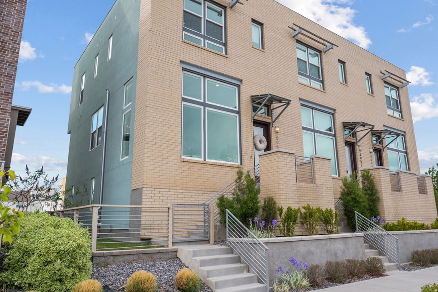 Welcome to this beautifully updated 3 bed, 3 bath end-unit townhome in the heart of Daybreak! With 2,072 sq ft of living space, this home is just steps from Oquirrh Lake, SoDa Row, and the new Salt Lake Bees stadium in Downtown Daybreak-one of Utah's most vibrant and walkable communities. Upgrades completed just 3 years ago include new carpet, full interior paint, updated bathroom hardware, garage and basement epoxy and paint.  The spacious great room features automated window shades, with manual shades in every other room. Downstairs, a large storage room off the garage offers flexible use as an office, home gym, or additional storage area. Enjoy extra perks like a radon mitigation system and a garbage can enclosure-a rare bonus that comes with being an end-unit. With full access to Daybreak's world-class amenities-including pools, parks, trails, and fitness centers-this is the perfect single-family townhome for anyone seeking space, convenience, and community.