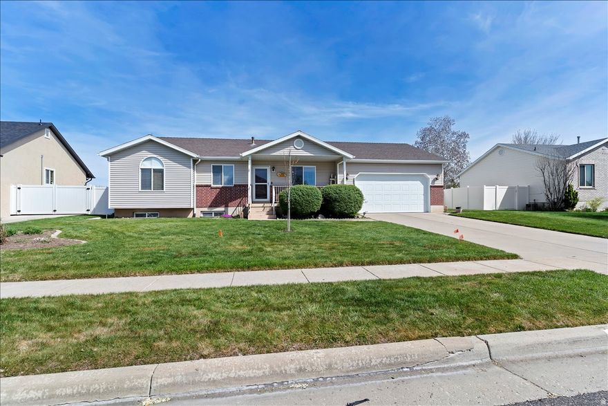Welcome to this spacious and well-maintained home in the heart of Syracuse! Featuring 5 bedrooms and 2 bathrooms, this home offers plenty of room to live, grow, and entertain. Enjoy a fully finished basement, abundant natural light throughout, and a functional layout designed for everyday comfort. The downstairs bathroom features durable tile flooring, and the kitchen includes a convenient 220V electrical hookup behind the stove-ideal for a variety of cooking setups.  Step outside to a generous yard complete with a garden area, storage shed, and full sprinkler system. The property also includes secondary water with two outdoor spigots, making yard maintenance both efficient and cost-effective-perfect for relaxing or hosting.  Major updates provide peace of mind, including a newer furnace, A/C, water heater, and a roof replaced in 2017.  This home combines space, thoughtful features, and outdoor charm-don't miss your opportunity to make it yours!