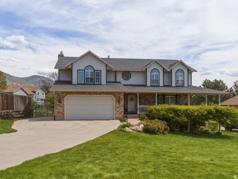 Photo of 1435 E WASHAKIE CIR S, Ogden, UT 84403 (MLS # 2152869)