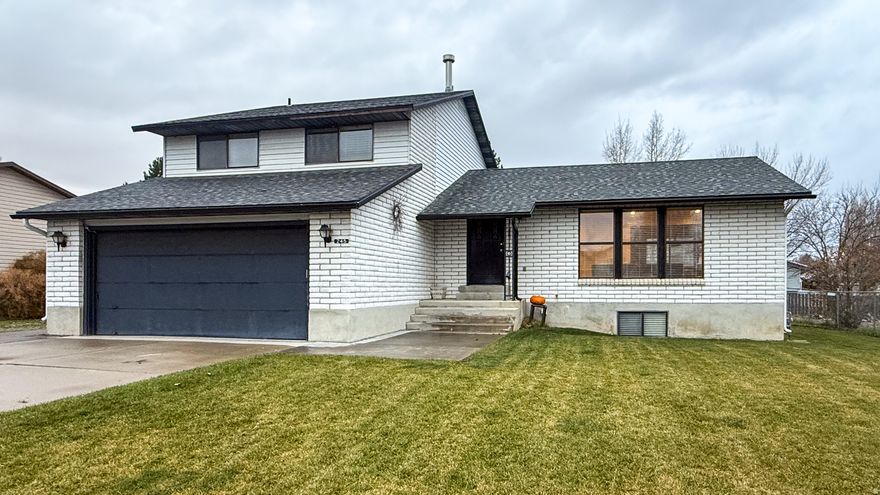 This Westwood tri-level home has the kind of warmth and care you notice the moment you step inside. Set on a quiet, peaceful street, it has been meticulously maintained and thoughtfully updated over time, giving it a comfortable, lived-in charm that's hard to find.  The main living spaces feel welcoming from the start, with natural light flowing easily between rooms and plenty of space for gathering. The bathroom update currently underway adds modern convenience, while the brand-new backyard deck opens the door to endless outdoor evenings-barbecues, quiet mornings, or simply relaxing in your own private space.  With four bedrooms and three-and-a-half bathrooms, the home offers a generous layout that easily adapts to the needs of a busy household. The fully fenced backyard, with a NEW deck, adds both functionality and privacy, making it ideal for play, pets, or entertaining.  Additional features include an attached two-car garage, partial basement with storage, mature landscaping, and mountain views that make this neighborhood so desirable. A quiet street, ample space, ongoing improvements, and a location within the Westwood community all come together to create a home that feels ready for its next chapter.  Beautifully cared for and offering room to grow, this is a property you won't want to miss.  Square footage figures are provided as a courtesy estimate only.  Buyer is advised to obtain an independent measurement.