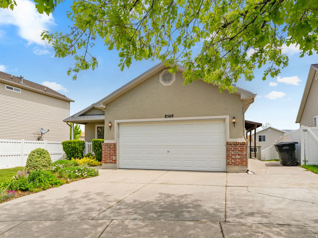 Photo of 8569 S SUNRISE OAK DR, West Jordan, UT 84081 (MLS # 2158060)