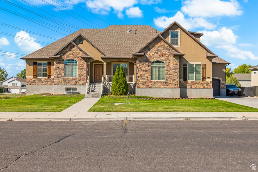 OPEN HOUSE SATURDAY, OCT 18th 11:00-1:00. Stunning Custom Rambler with Basement Apartment & Oversized Yard! Enjoy thoughtful upgrades throughout, including a custom kitchen, main level primary suite with luxurious bathroom, spacious custom closets, and high ceilings that create an open, airy feel. Bonus loft area offers 2 bedrooms and 1 bath, but could be used as a home office, playroom, or creative retreat. The walk-out basement apartment features 9' ceilings, its own separate driveway and entrance, ideal for guests, extended family, or rental income potential. Enjoy the .61-acre yard complete with an in-ground trampoline, fire pit, gas stub for grilling, fruit trees, and garden boxes-a dream setup for entertaining or family fun!  As a bonus, included is a nearly-new Bullfrog S200 swim spa-combining the best of a pool and hot tub experience. Property also borders the scenic Powerline trail, offering instant access to walking, running, and biking paths right from your backyard. A massive 3-car garage with loft storage and a second driveway provide all the space you need for vehicles, toys, and projects. Seller offering a $10,000 credit toward buyer's closing costs or new flooring-choose your perfect look and make this home your own!