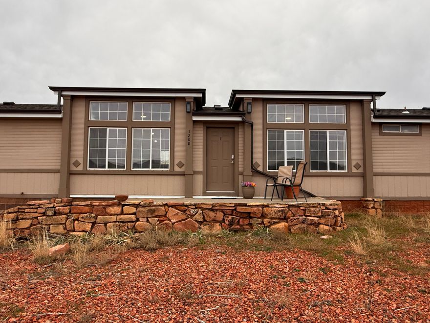 Come take a look at this one of a kind home with surrounding views of red rock! This home has been fully renovated, including: new roof, water heater, water softener, electrical service, water lines, heating and AC, fixtures and lighting, new septic tank system and SO much more! Bright and open floorplan. There is a separate ADU that is fully ADA accessible! The potential for a nightly or monthly rental in this tourist friendly town is great! Schedule a showing today! Square footage figures are provided as a courtesy estimate only and were obtained from county records. Buyer is advised to obtain an independent measurement.