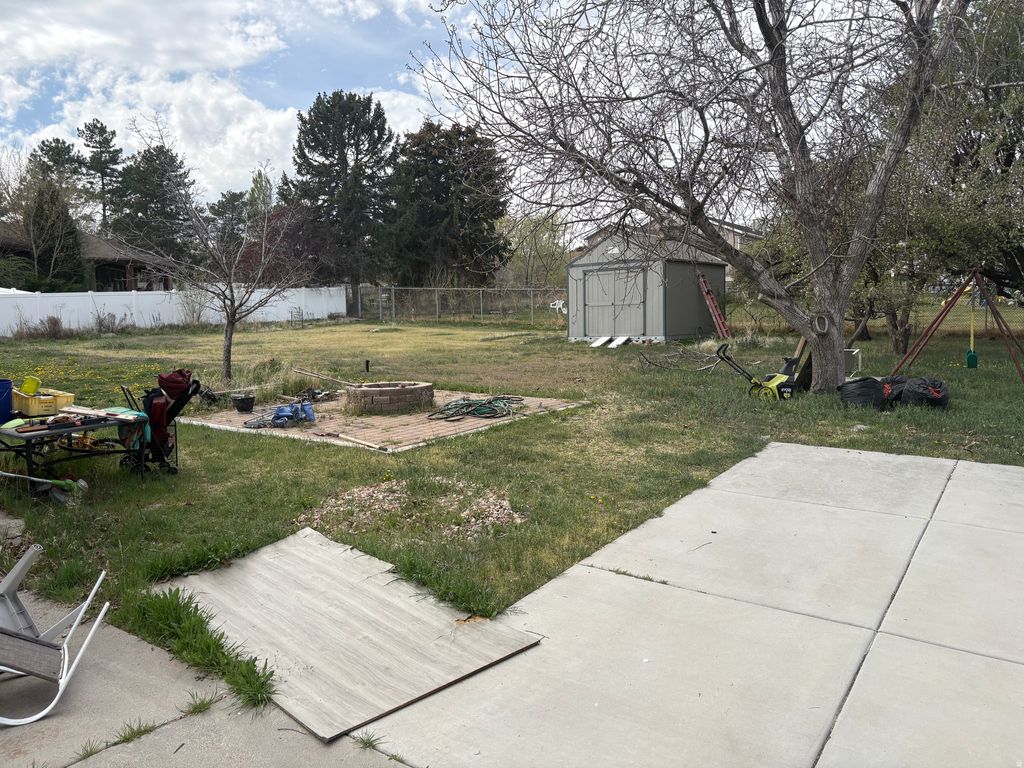 Photo of 5650 S JORDAN CANAL RD W, Taylorsville, UT 84129 (MLS # 2146838)