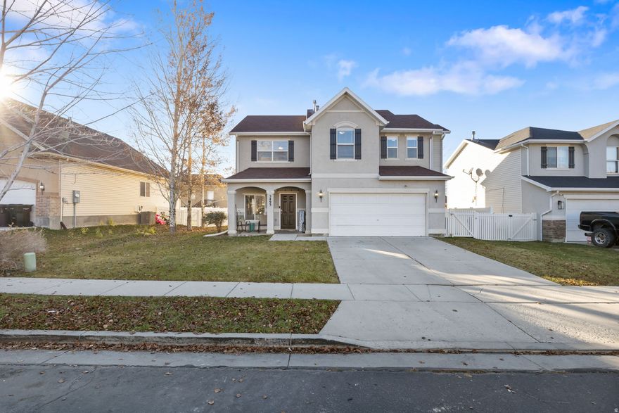 Welcome to the Heart of Stansbury Park! This beautiful 4-bedroom, 3-bathroom home offers the perfect blend of comfort, style, and space in one of Tooele County's most sought-after communities.  Step into a NEWLY REMODELED KITCHEN featuring quartz countertops, updated appliances, new sink, and plenty of workspace for cooking, entertaining, and everyday living. Just off the kitchen, you'll find two large living rooms, giving you all the room you need for gatherings, game nights, or creating a cozy separate space for entertaining, hobbies, or a home office.  BRAND NEW CARPET (not pictured) was also installed just this week. The spacious primary suite is a retreat of its own with a large layout, a private en-suite bathroom, and plenty of room to unwind.  Outside, enjoy a freshly updated backyard complete with a BRAND NEW FENCING and NEW SOD, providing a clean slate ready for pets, play, or summer BBQs.  To help make the home truly yours, the sellers are open to negotiating a carpet allowance.  Don't miss the chance to own a beautifully updated home in the heart of Stansbury Park-close to parks, schools, trails, and everything this welcoming community has to offer! All information is provided as a courtesy only. Buyer and buyer's agent to verify all information.