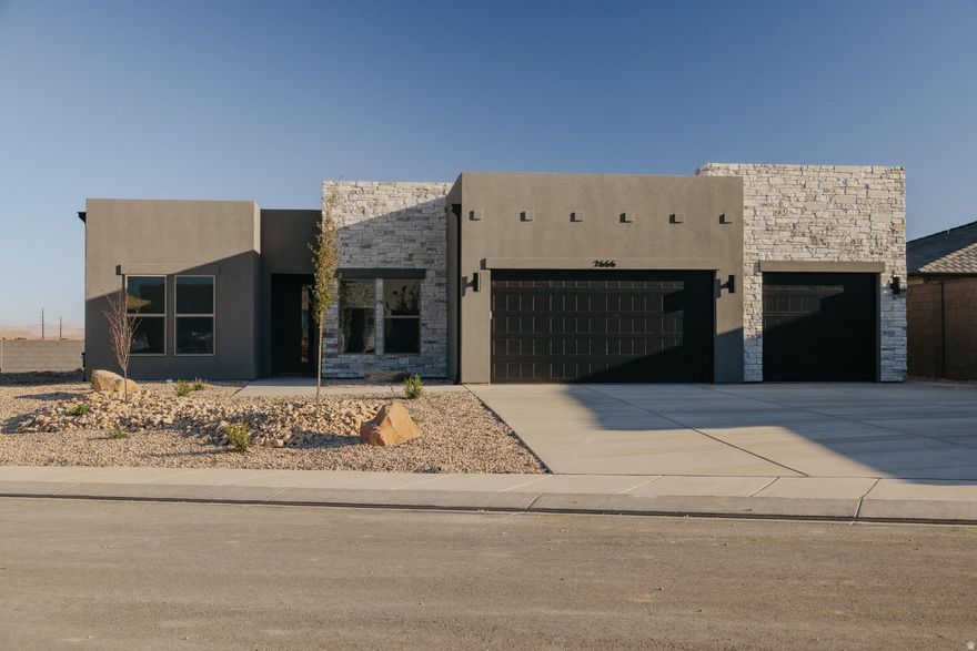 This brand-new, move-in-ready Denali rambler sits on a premier corner lot with incredible views. Designed for comfort and quality, it features 2x6 construction, R50 ceiling and R19 wall insulation, 9-ft ceilings, 8-ft doors, and quartz countertops throughout. Enjoy an open layout with 3 beds, 2.5 baths, an 11-ft tray ceiling in the family room, and a 42" fireplace. The gourmet kitchen includes a 7'x5' island, vented hood, Whirlpool stainless appliances, and extended tile backsplash. The owner's suite offers a spa-like bath with a large walk-in shower and double vanity. Relax on the extended covered patio and enjoy access to the private community pool.