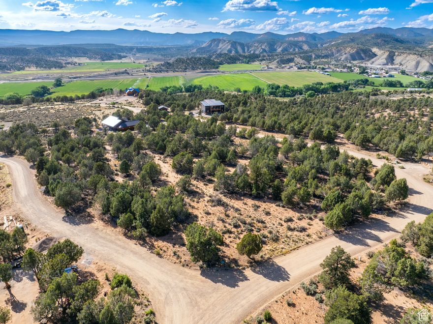 Tucked on a hill above Orderville, in Quarter Circle H Ranch, this lot is well-suited for anyone who wants to be in a small town, but still have daily amenities not far away.  Located along Highway 89, Orderville is not far from Zion National Park (east entrance), Bryce Canyon National Park, Grand Staircase-Escalante National Monument, and just a bit farther from Grand Canyon National Park and Lake Powell.  Kanab is the closest 'major' town.  All wet utilities are hooked up, and sewer, water and electrical are stubbed to the lot.