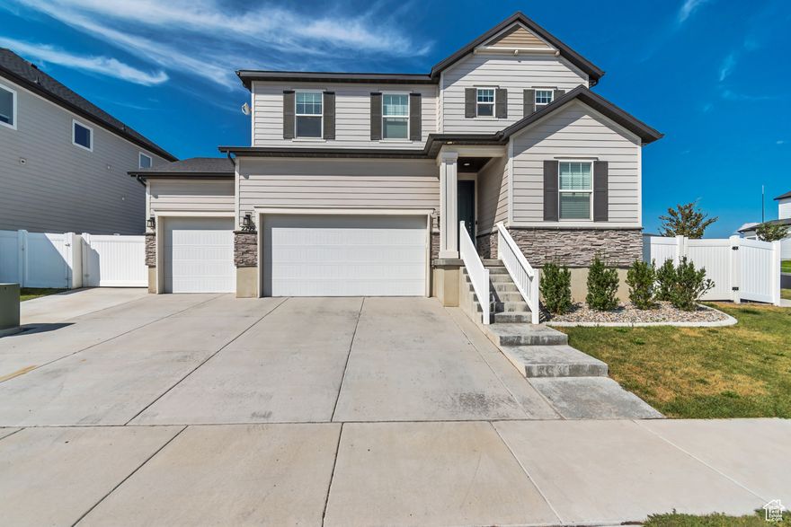Welcome to your dream home in the sought-after Wildflower master-planned community! This stunning, newer-build property offers a perfect blend of style, functionality, and outdoor living. Step inside to discover an abundance of natural light streaming through large windows, highlighting the builder upgrades and elegant finishes throughout. The spacious kitchen features quartz countertops, a custom tile backsplash, and beautifully tiled showers in two of the bathrooms. Enjoy the convenience of a 3-car garage plus RV parking, ideal for all your vehicles and toys. The beautifully landscaped yard includes a large, covered patio with built-in lighting, perfect for entertaining or relaxing year-round. There's also a shed with electricity, offering extra storage or workspace potential. As a resident of the Wildflower community, you'll have exclusive access to the private Wildflower Reservoir, pickleball courts, parks, and opportunities for swimming and water sports. Don't miss your chance to tour this exceptional home. Schedule your showing today!
