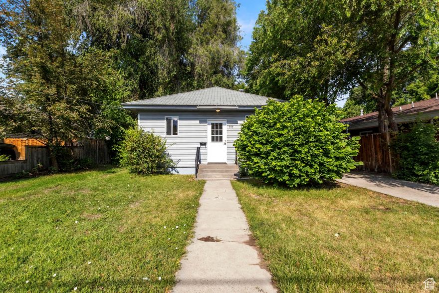 This clean and move-in ready 2-bedroom, 1-bath home sits on a treelined .23-acre lot in central Logan. Built in 1922, it offers solid bones and a simple, functional layout-perfect for first-time buyers, investors, or anyone looking for a home with potential. Enjoy plenty of outdoor space for relaxing, gardening, and pets, and there are no residential neighbors at the back of the lot. Conveniently located near downtown Logan, USU, schools, and shopping. A great opportunity to own your own place and make it your own!