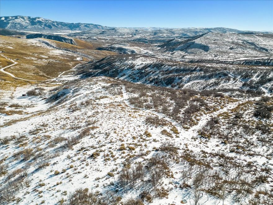Incredible chance to acquire three contiguous parcels in Rockport Ranches, spanning over 37 acres. Enjoy breathtaking views of Rockport Reservoir, Deer Valley, Promontory Nicklaus Golf Course, and the expansive Uintah Mountain Range. This is the perfect canvas to construct your ideal mountain retreat or compound within a secure gated community. Nestled at the heart of prime recreational activities such as fishing, boating, snowmobiling, and horseback riding, with seamless access to world-class skiing. The property offers unparalleled design flexibility, allowing for the creation of two primary residences, secondary dwellings, and additional outbuildings. Seize this rare opportunity to craft a lifestyle that harmonizes with nature's grandeur and endless possibilities.