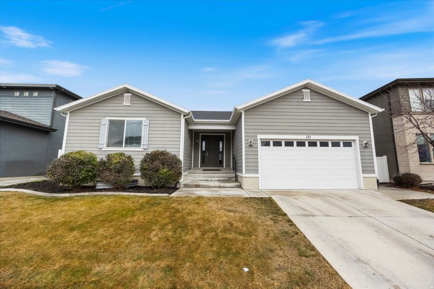 **Open House Saturday, March 14th 12:30-3:00** Experience one of Utah County's premier communities in the heart of Vineyard! This spacious single-family home offers ample versatile living space, featuring 6 bedrooms and 4.5 bathrooms with a *fully finished 3 bedroom, 2 bath ADU with separate entrance*. (occupied through Sept.) The open-concept main level has a seamless flow, tall ceilings, abundant natural light, and mountain views  ideal for everyday living and hosting. The 'rambler' layout makes for large bedrooms throughout  great for growing families, guests, home offices or tenants. Minutes from Bella's Market, the UTA Frontrunner, parks, walking trails, Utah Lake access, schools, restaurants and more. This home combines functionality and convenience with income opportunity. HOA provides access to clubhouses, pools, hot tubs, and gyms. This is a rare property in a high demand area  won't last long!