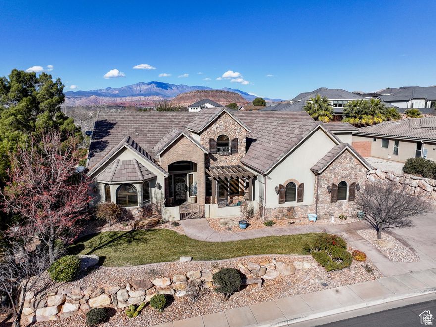 Incredible custom home with exterior features of an inground heated pool, an outdoor barbecue island covered by a large pergola and RV or boat parking on driveway. The interior of the home features a breathtaking entrance with tall ceilings, a huge gourmet kitchen with a large island adorned with beautiful granite counter tops, stainless steel appliances, a theatre room with kitchenette serving area, 3 fireplaces, a large office or study, multiple living rooms, enormous master suite, 4 large additional bedrooms with adjoining bathrooms, arched brick entrances, elegant hardwood trim molding throughout and so many other features to list. Please call or inquire with questions or for a private showing on this one of kind exquisite home.